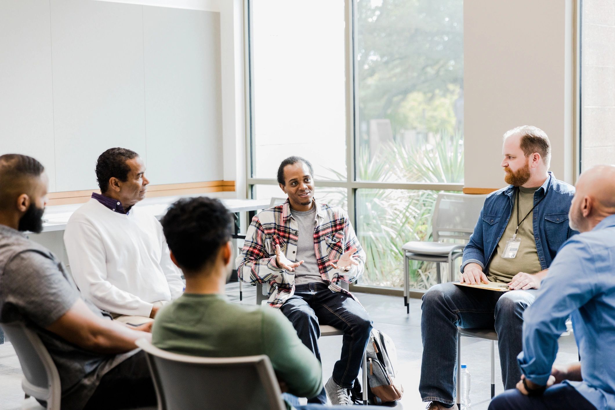 Small group discussion around a table