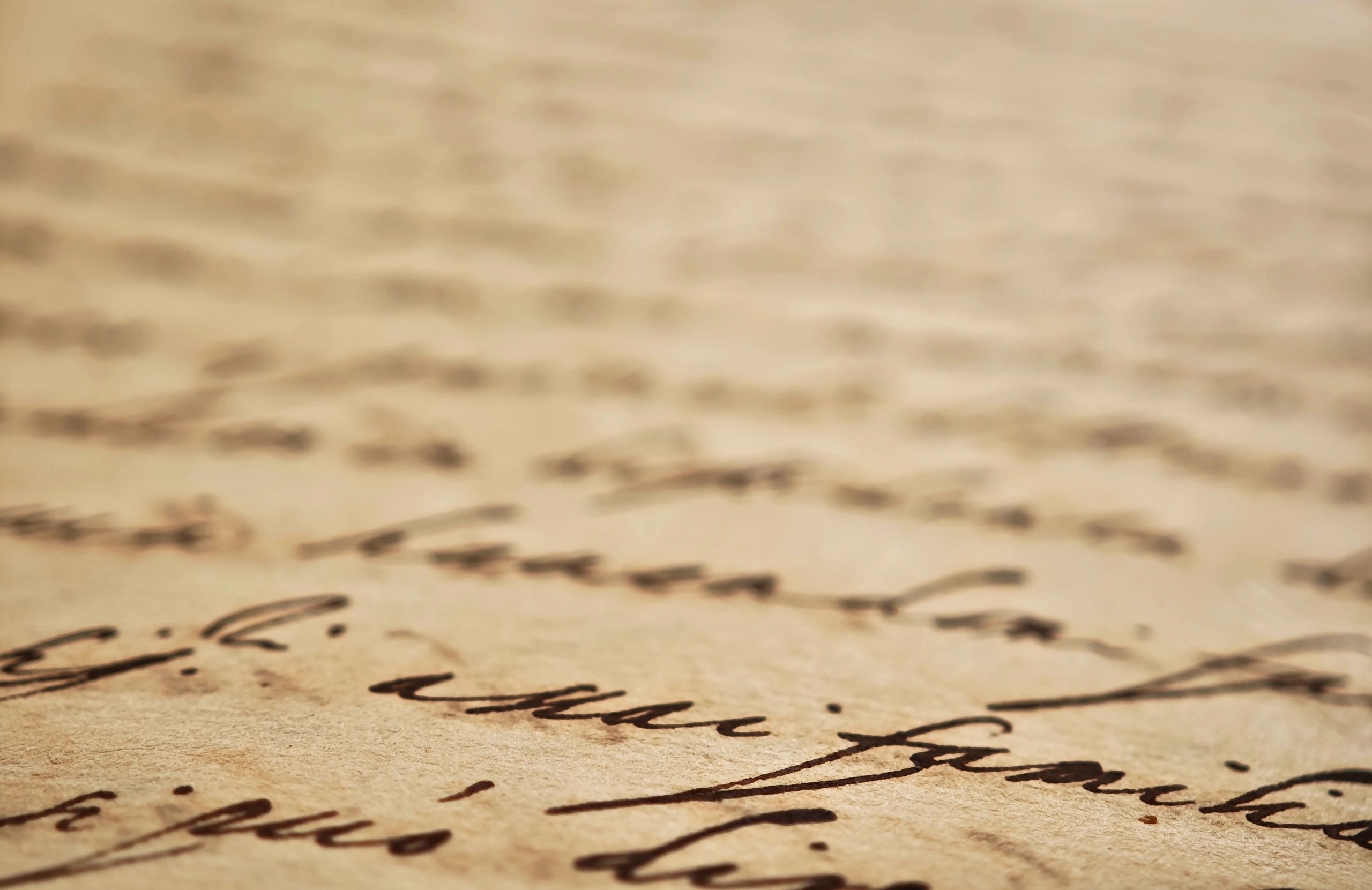 Close-up of an old handwritten manuscript on parchment